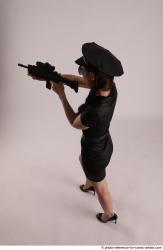 Woman Adult Average White Fighting with gun Standing poses Casual